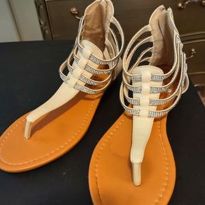 Goldtoe sandles with bling. Worn one time and was tight.  Size 8
